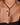 person wears big cross necklace around their neck with a black top and a touch of cleavage showing 