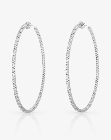 large silver hoop earrings with small pave cubic zirconia stones shown on grey background
