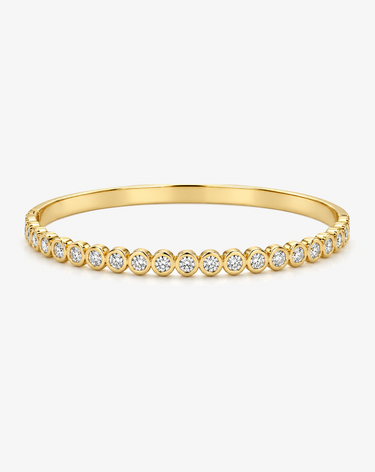 Full Circle Bangle in 18k gold plated stainless steel with round bezel-set CZ stones, hinged closure